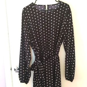 Polka dot belted ruffle hem dress.